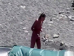 Naturist woman at beach