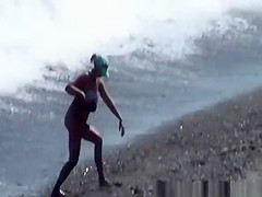 Naturist woman at beach