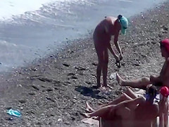 Naturist woman at beach