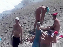 Naturist woman at beach