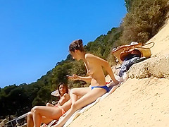 Peeking on some charming topless girls