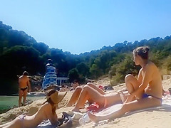 Peeking on some charming topless girls