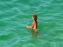 Topless women at beach