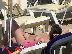 Topless women at beach