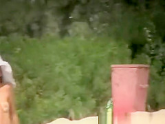 Nude and topless women in beach