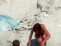 Small boobs woman spied in beach