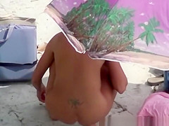Nude redhead woman with shaved puss