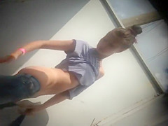 Teen girl dressing after a beach day