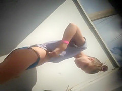 Teen girl dressing after a beach day