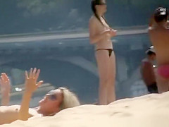 Nude wife and topless girls in beach