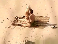 lone couple has sex on public beach