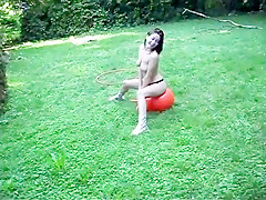 Nude in her garden