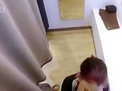 Redhead sucks bbc in changing room