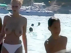 Nicely hanging blonde girl's tits