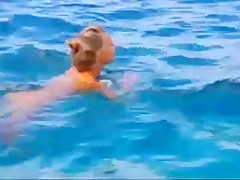 Nude beach - hot blond posing on the rocks