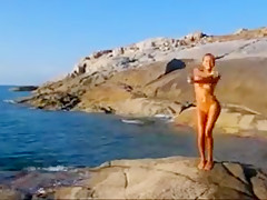 Nude beach - hot blond posing on the rocks