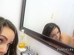 Cute brunette bangs in public restroom