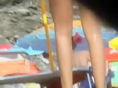 Pretty nudist girl spied for a while
