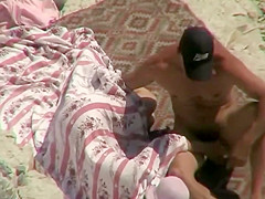 He disturbed her beach relaxation