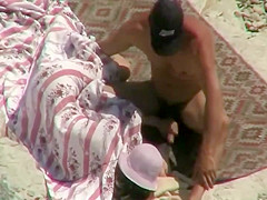 He disturbed her beach relaxation