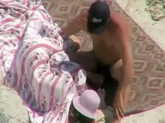 He disturbed her beach relaxation
