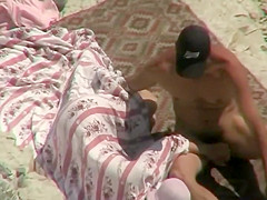 He disturbed her beach relaxation