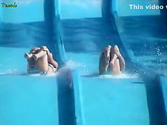 Accidental nipple slip at a water slide