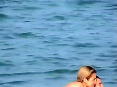 Skinny girl rushing out of the water