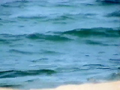 Skinny girl rushing out of the water