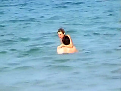 Skinny girl rushing out of the water