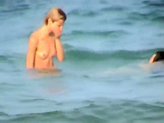 Skinny girl rushing out of the water