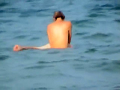 Skinny girl rushing out of the water