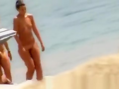 Two girls naked at beach