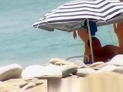 Two girls naked at beach