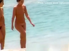 Two girls naked at beach