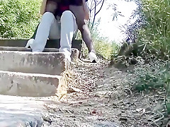 Cinese milf in a public park