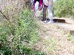 Cinese milf in a public park