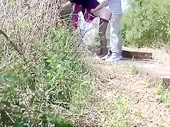 Cinese milf in a public park