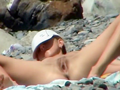 Woman mounted on a beach