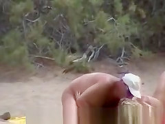 Nude couples on beach