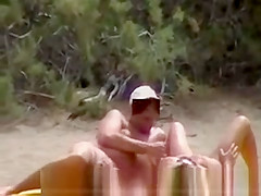 Nude couples on beach