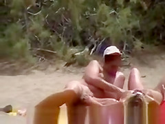 Nude couples on beach