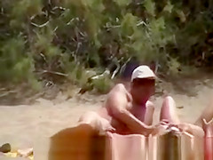 Nude couples on beach