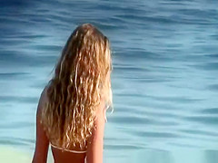 Long hair blonde teen in sexy bikini