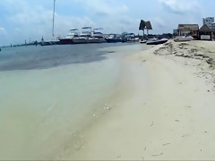 Naughty christine - applying lotion on a topless beach