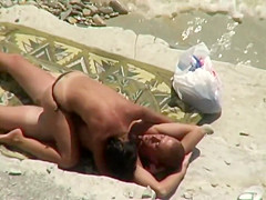 Woman initiates beach sex