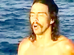 African hairy girl and 2 guys on the rocks