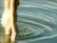 Teen girl spied as she swims in a lake