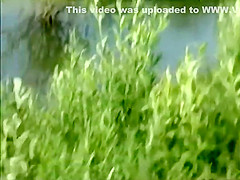 Teen girl spied as she swims in a lake