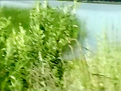 Teen girl spied as she swims in a lake